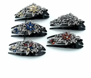 Flat lay view of crystal rhinestone flower hair claws in five elegant color options