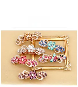 Detailed set of floral hair clips with rhinestones and crystal bow designs