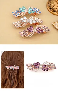 Detailed views of a butterfly hair clip with colorful crystals and rose gold finish