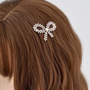 Sparkling rhinestone butterfly hair clip set in silver metal for elegant hair styling