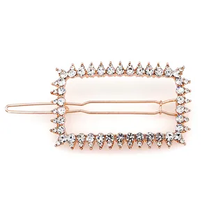 Elegante pinza de pelo rectangular en oro rosa con brillantes diamantes de imitación