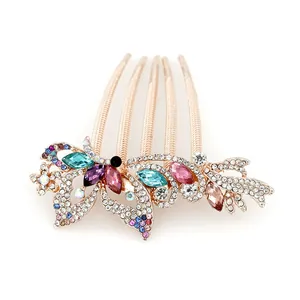 Elegant rose gold butterfly hair comb with vibrant colorful crystals and rhinestones