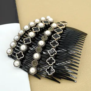 French vintage hair comb with pearls, clovers and rhinestones in a layered display