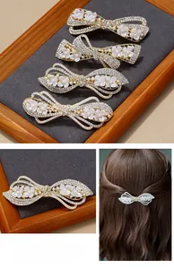 Detail of four-piece pearl and rhinestone butterfly hair clips with alloy base