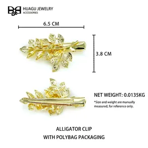 Minimalist golden leaf hair clip made of metal alloy with detailed vein texture