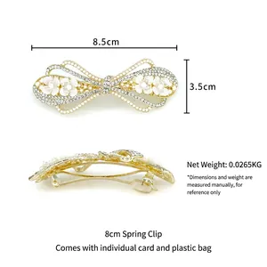 Elegant gold bow hair clip with pearls, rhinestones, and shell flowers, 8.5cm spring clip