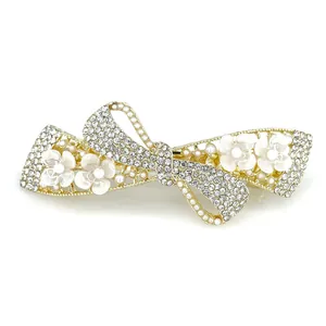 Elegant bow hair clip with white flowers, sparkling rhinestones and pearls on gold alloy