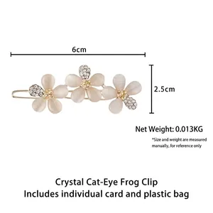 Elegant cat eye stone flower hair clip with crystals, dimensions 6cm x 2.5cm