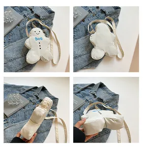 Multi-angle view of a cute plush gingerbread man crossbody bag with blue bow details