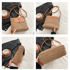 Detail view of straw crossbody bag with brown leather flap and stylish metal rivets