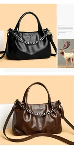 Chic tote bags in black and brown PU leather featuring metallic chain and slim straps