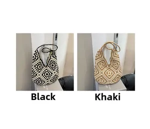 Detail of woven hobo shoulder bags in black and khaki featuring floral crochet patterns