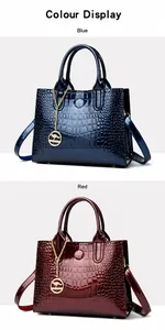 Crocodile pattern handbags in blue and deep red with glossy patent finish and golden charms