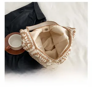 Detail shot of the checkered crochet tote bag with magnetic closure and spacious interior
