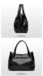 Detail view of large black tote bag showing smooth leather texture and rear zipper pocket