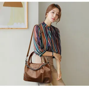 Caramel large capacity leather tote bag with metal chain and adjustable strap