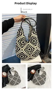 Close-up of black and white floral crochet shoulder bag in a lifestyle setting