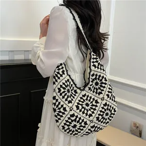 Handcrafted sunflower crochet tote bag in black and white for women's summer casual style
