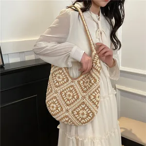 Handcrafted crochet tote bag with mandala sunflower patterns in cream and camel shades