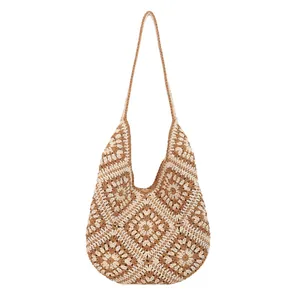 Handmade crochet shoulder tote bag with bohemian floral knit patterns in beige and brown
