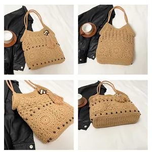 Detail of bohemian straw shoulder bag with crochet patterns, beads and fringe tassel
