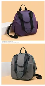 Detailed view of large capacity gradient nylon backpacks with brand logo and side pockets