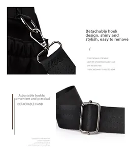 Detail of silver metal hooks and adjustable buckle on black nylon shoulder bag strap