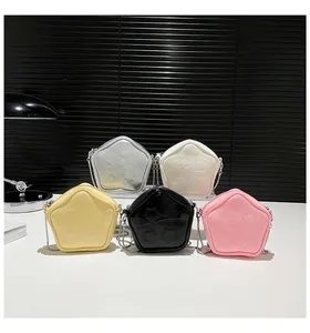 Detailed collection of star-shaped crossbody bags in silver, cream, yellow, black and pink