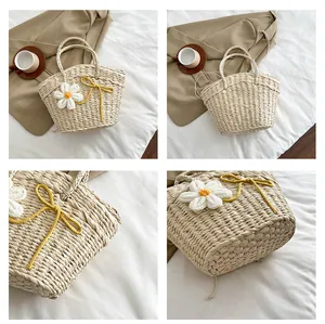 Détails du sac en paille tressée avec marguerites tricotées et nœuds jaunes décoratifs