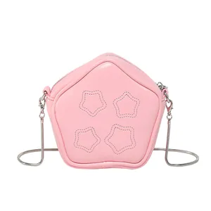 Chic pink star-shaped crossbody bag with silver chain strap and minimalist star stitching