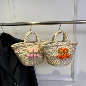Mini straw handbag set with handmade crochet floral pattern in refreshing rural style