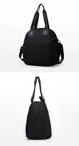 Detail of black large capacity tote bag featuring LUCYK DIAMODN PARIS embossed text
