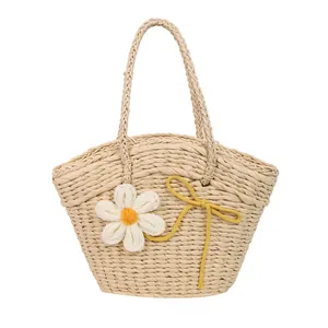 Sac fourre-tout en paille avec marguerite et nœud jaune pour la plage et l'été