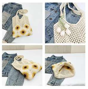 Detail view of handmade crochet sunflower tote bag with hollow knit patterns and sturdy handles