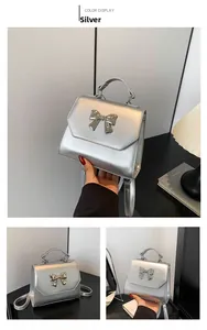 Detailed views of a silver metallic PU leather handbag with a stylish metal bow detail