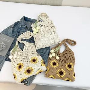 Handmade crochet tote bags with sunflower patterns and tulip pendants for summer vacation