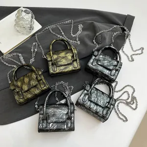 Gothic punk mini crossbody bags with metallic skull, cross, and spider patterns with chains