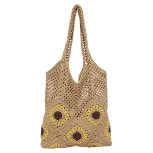 Retro hand-woven straw tote bag with sunflower hollow crochet design for summer vacation