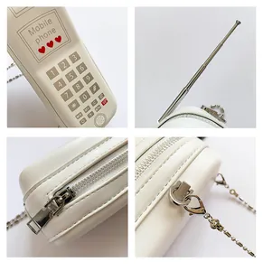 Détails du sac téléphone rétro blanc avec fermeture éclair et bandoulière chaîne
