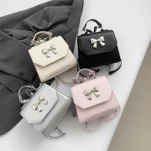 Women's 2025 mini square handbag set in beige, black, silver, and pink with metal bows