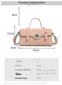Detail view of pink PU leather handbag showing compact structure and metal turn-lock closure