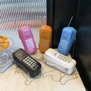 Sacs à bandoulière créatifs en forme de téléphone rétro en cinq couleurs avec chaînes