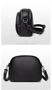 Detail view of the black lychee pattern leather crossbody bag with triple zippers