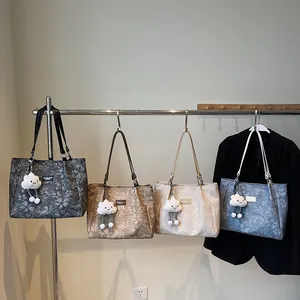 Chic large-capacity floral tote bags in four colors with cute cloud pendants for commuting