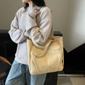 Cream canvas tote bag for women with large capacity and shoulder strap for casual daily use