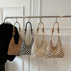Handmade crochet shoulder bags with floral patterns and wooden bead handles set