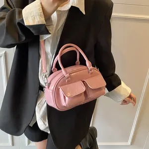 Pink patent leather underarm pillow bag with functional front pockets for women