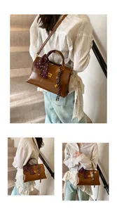Three lifestyle views of a vintage brown leather shoulder bag with a silk scarf handle