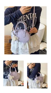 Detailed views of a lavender pleated shell bag with pearl heart and lace bow accents