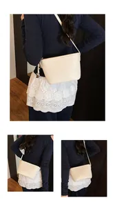 Detailed view of beige woven bucket bag showing intricate cross-knit texture and side zipper